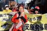 実行委員長の椎名千恵子さんは、原発事故の犠牲者に黙祷を捧げた。=11日、福島市内　写真：諏訪撮影=